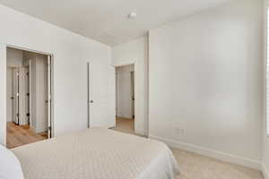 Bedroom with light wood-type flooring