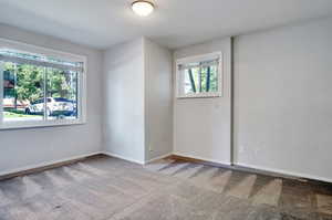 View of carpeted spare room