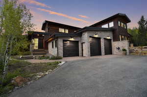 View of front of property with a garage