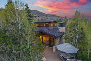 View of front facade featuring a patio and a mountain view