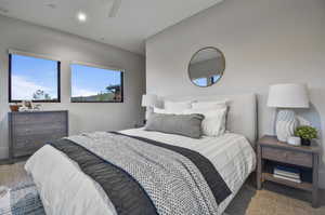 Bedroom featuring carpet floors and ceiling fan