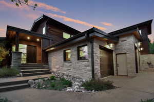 Contemporary home featuring a garage