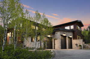 View of front of property with a garage