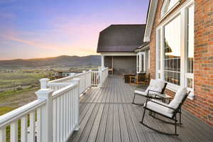 Deck at dusk with a mountain view