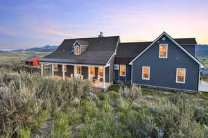 View of front of home featuring a mountain view