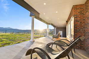 View of patio / terrace with a mountain view