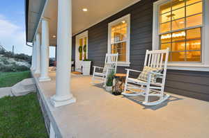 View of patio with a porch