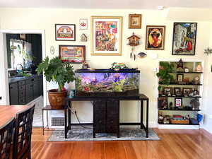 Eclectic art wall with built in shelves.