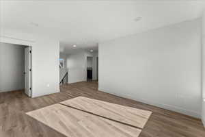 Unfurnished room with light hardwood / wood-style floors