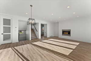 Unfurnished living room featuring light hardwood / wood-style flooring