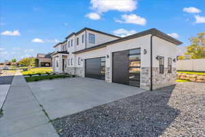 View of front of property with a garage