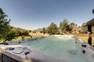 View of swim spa featuring a mountain view