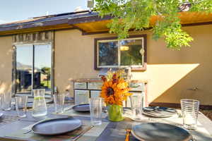 Rear view of house with a patio area