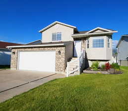 View of front of home with a front lawn