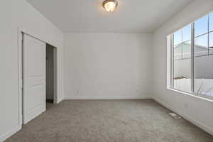 View of carpeted spare room