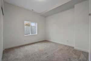 Spare room with carpet flooring