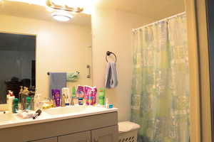 Bathroom with toilet and vanity