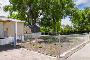 View of yard with an outdoor structure