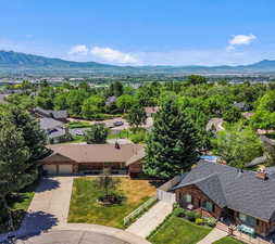 Birds eye view of property featuring a mountain view