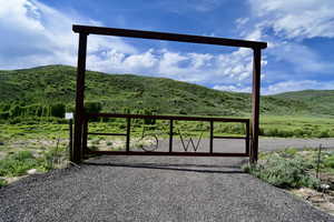 View of gate with a mountain view