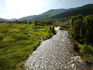 View of mountain feature with a water view