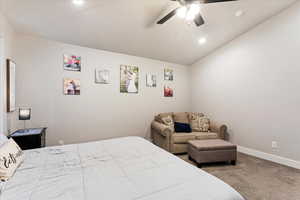 Bedroom with carpet and ceiling fan