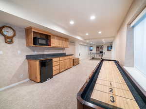 Playroom featuring light colored carpet