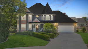 Beautiful custom home with large porch, 5 beds, unfinished basement and extra deep 2 car garage in fantastic neighbrohood