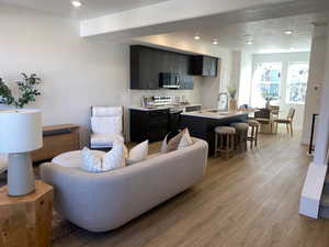 The heart of the home—where cooking, lounging, and memory-making all happen in one beautiful space. *model