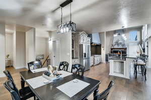 Dining space featuring wood-type flooring