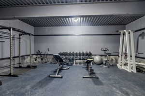 Workout area featuring concrete flooring