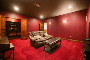 Home theater featuring carpet