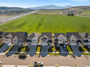 Birds eye view of property with a mountain view