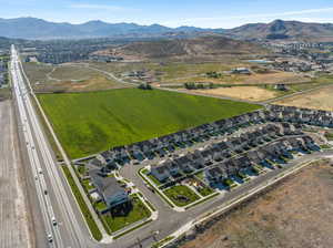 Birds eye view of property with a mountain view