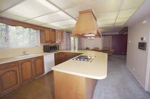 Kitchen with sink and white appliances