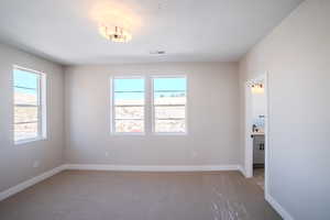 View of carpeted spare room