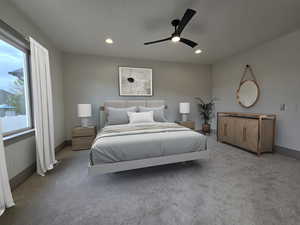 Carpeted bedroom with ceiling fan