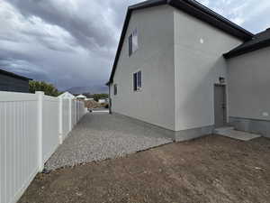 View of property exterior with a mountain view