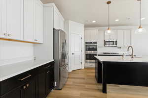 View of kitchen featuring double oven