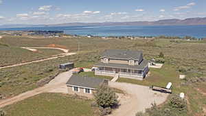 Bird's eye view with a water and mountain view