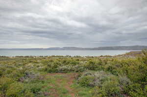 Exterior space featuring a water and mountain view