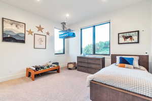 Bedroom featuring carpet