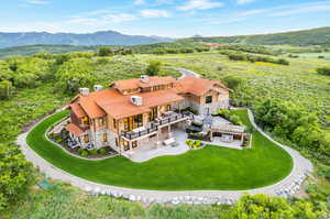 Drone / aerial view featuring a mountain view