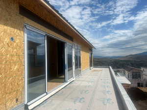 Deck from the front looking towards the back of the home