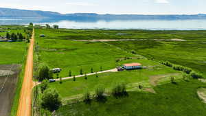 Bird's eye view featuring a rural view and a water and mountain view