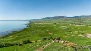 Bird's eye view featuring a rural view and a water and mountain view