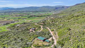 Birds eye view of property with a mountain view