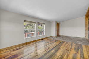 Unfurnished room with wood-type flooring