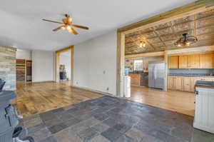 Interior space featuring tile flooring and ceiling fan