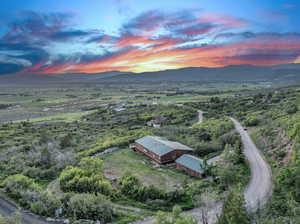 Aerial view at dusk with a mountain view